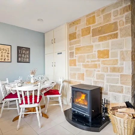 An Teachin Corcra Rosmuck